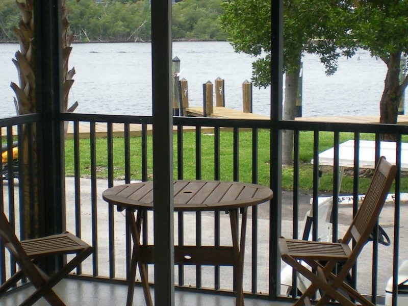 This image shows the private patio or balcony handing out an overlooking view outside the apartment featuring the ocean and Intracoastal views.